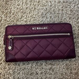 MZ Wallace Crosby Long Wallet in a purple or color crafted from quilted nylon